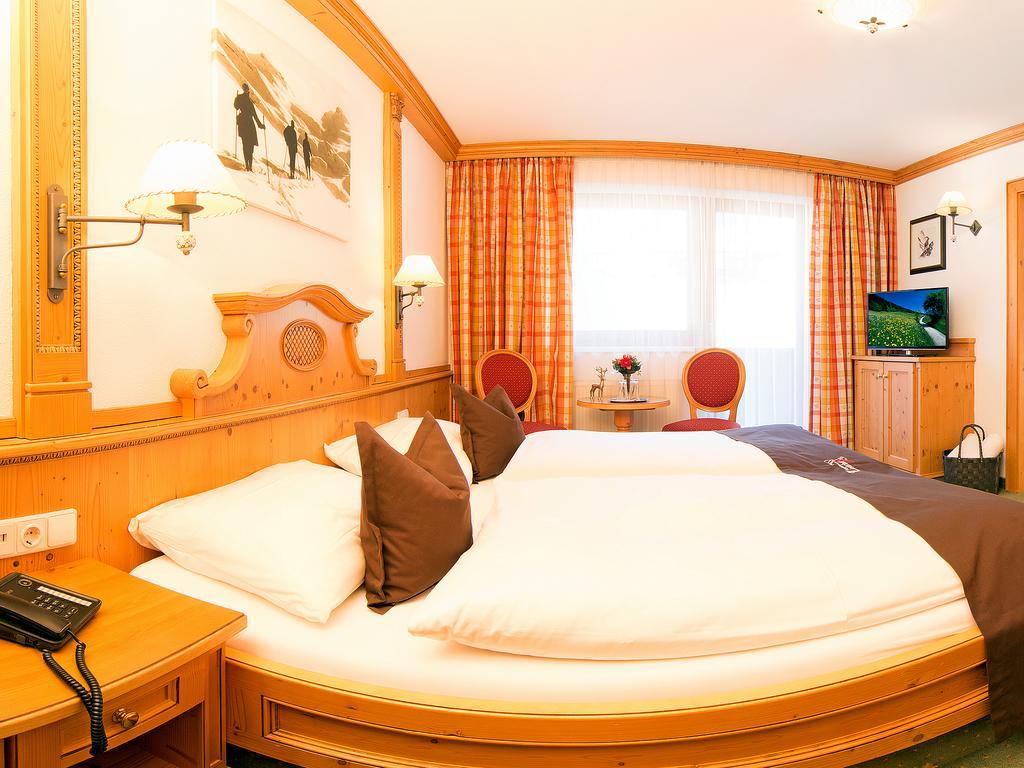Alpenhotel Tirolerhof Нойштіфт-ім-Штубайталь Номер фото